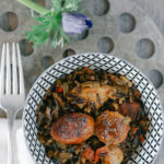 Delicious and easy-to-make Paleo Paella! Made with wild rice, chorizo, and saffron, this aromatic dish is sure to please!